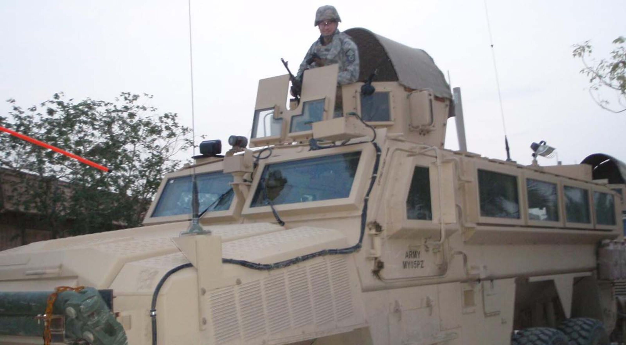 A photo shows Master Sgt. Duane Frey during his deployment to Iraq in 2008 as the turret gunner during a convoy operation. During some of his travels to about 16 regional contracting centers scattered across Iraq (as far north as Mosul and as far south as Bucca), Sergeant Frey’s team engaged with the enemy trying to harm the team via improvised explosive devices, small arms fire, mortars and rockets. (Courtesy photo)