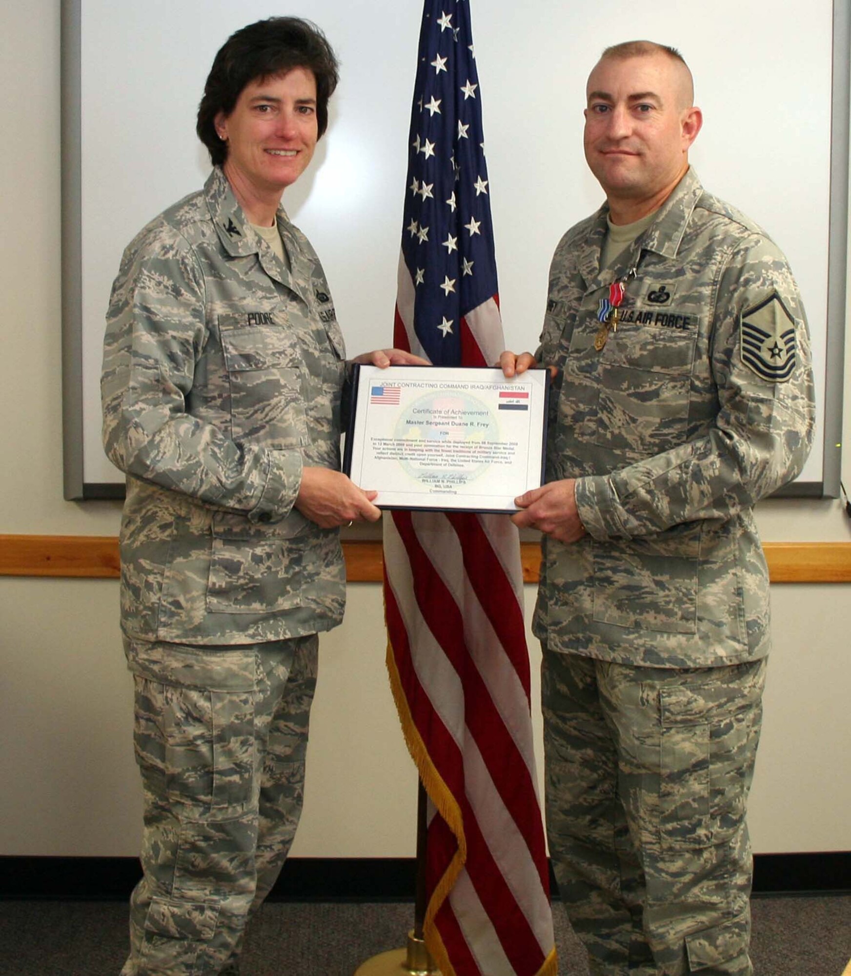 In a ceremony here Sergeant Frey was also presented the U.S. fourth-highest combat decoration, the Bronze Star, which he earned for his actions in support of Operation Iraqi Freedom in 2008.  (U.S. Air Force photos by Staff Sgt. Olufemi Owolabi) 