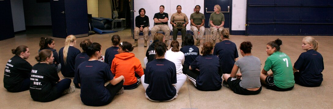 A group of female Marines conduct a group discussion with female poolees of Recruiting Station Milwaukee during a female pool function March 30 at the U.S. Marine Corps Reserve Center in Madison, Wis. RS Milwaukee recruiters hope a new focus on female-only functions will lower its female pool attrition rate, which is currently at 26 percent.