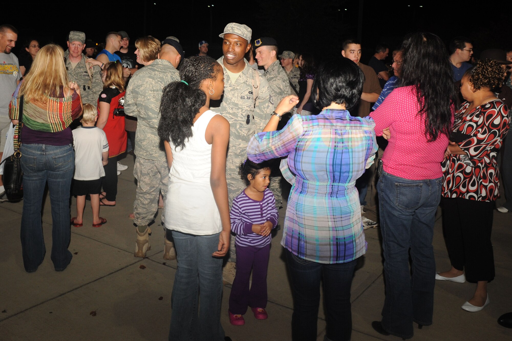 SHAW AFB S.C.-- Members of the 20th Security Forces Squadron greet family and friends here after re-deploying from Afghanistan Oct. 31. (U.S. Air Force Photo/Senior Airman David Minor)