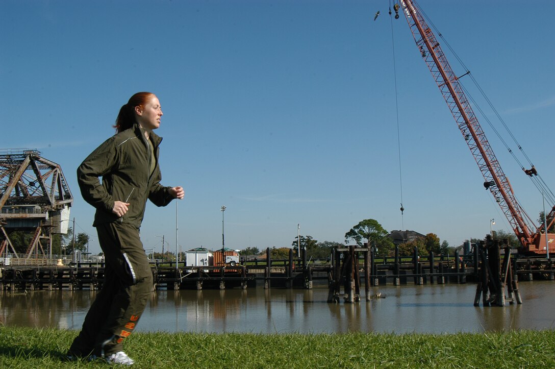 First Lt. Shannon Goans, an Innovative Readiness Training program assistant manager here, trains for a 50-mile ultramaration along the industrial canal adjacent to Marine Forces Reserve Headquarters here. Goans, who was commissioned through the Officer Candidate Course, Reserve in 2007, is scheduled to study full-time for her doctorate degree in forensic psychology.