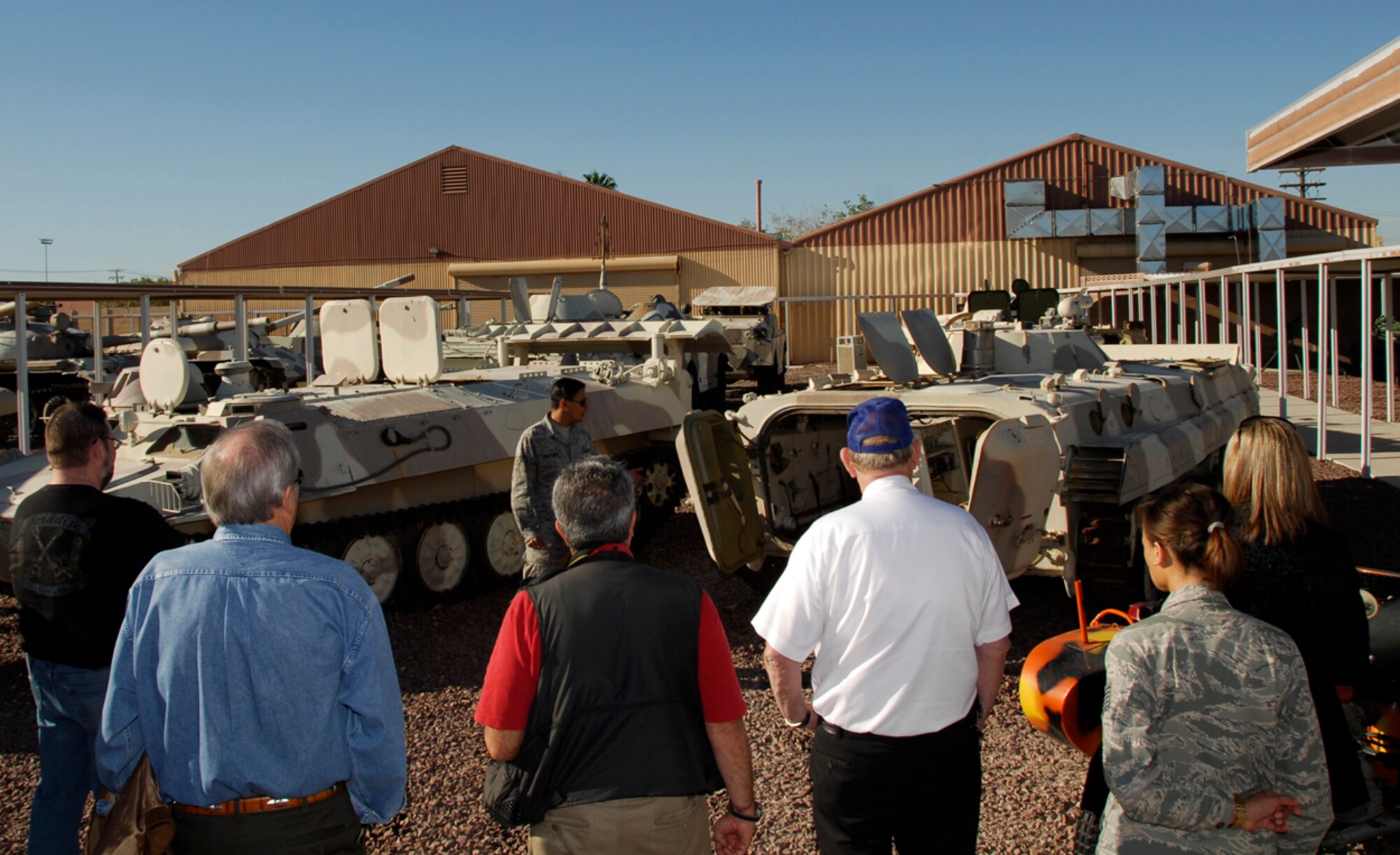 Members of the 188th Fighter Wing along with employees of the Federal Aviation Administration (FAA) and local Arkansas media look on during a guided tour of the 547th Intelligence Squadron's Threat Systems Area, informally dubbed "The Petting Zoo," at Nellis Air Force Base, Nev., Oct. 15 during a civic tour to the base. The primary objective was to observe the 188th's deployment preparations for the unit's upcoming Aerospace Expeditionary Force (AEF) rotation in Afghanistan in spring 2010. (U.S. Air Force photo by Senior Master Sgt. Dennis Brambl/188th Fighter Wing Public Affairs) 