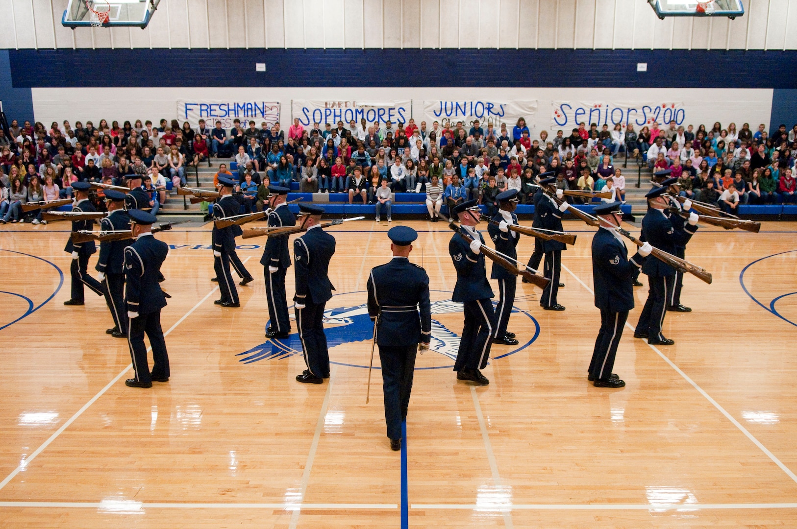 Members of the U.S. Air Force Honor Guard Drill Team perform for students of Randolph Middle School during an assembly Nov. 2. (U.S. Air Force photo/Steve Thurow)