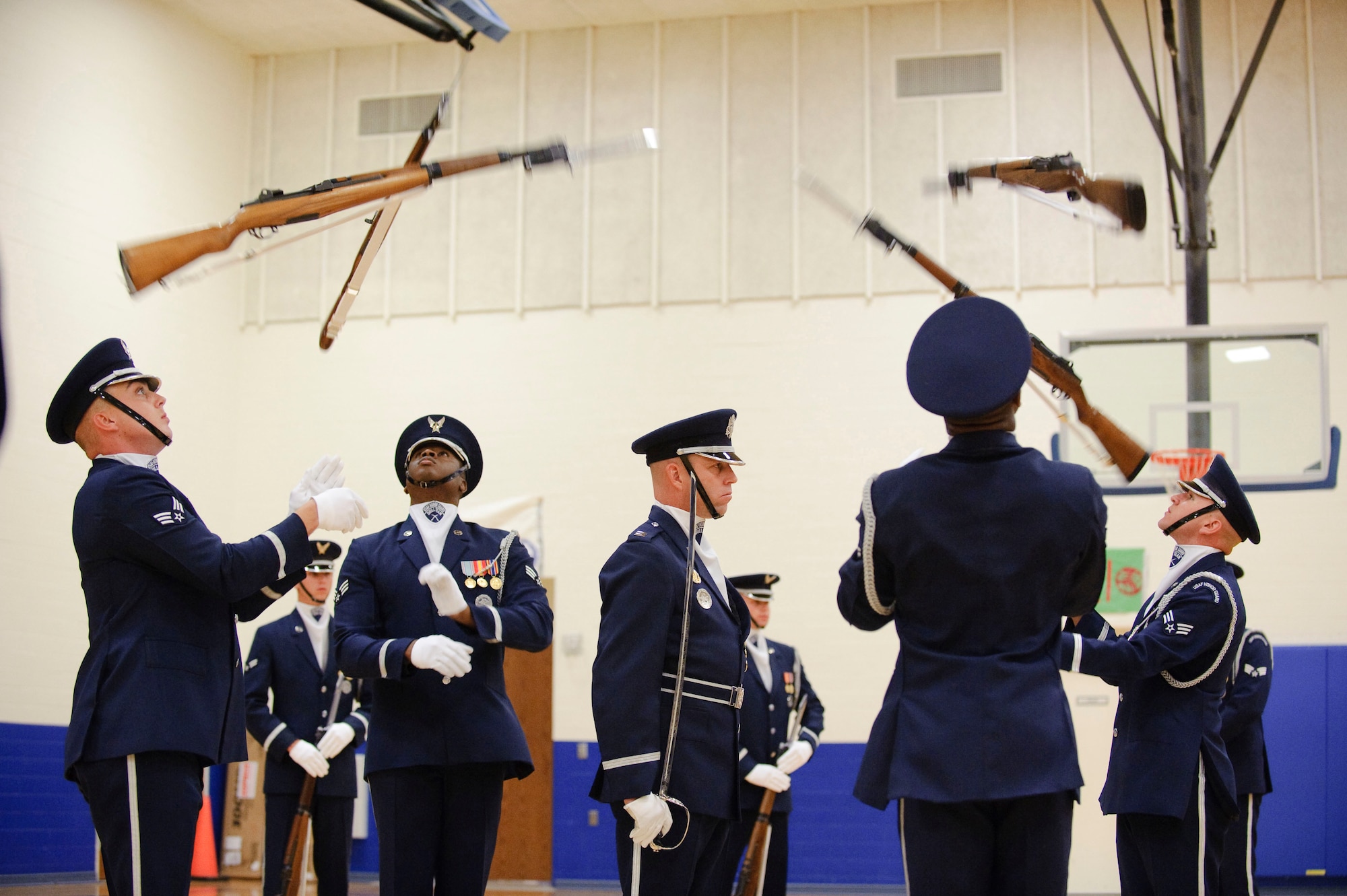 Capt. Michael Fanton, U.S. Air Force Honor Guard Drill Team commander and his four-man team display Air Force precision and professionalism during a performance for the Ro-Hawks of Randolph High School during an assembly Nov. 2. (U.S. Air Force photo/Steve Thurow)