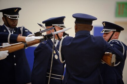 Capt. Michael Fanton, U.S. Air Force Honor Guard Drill Team commander and the four-man team display Air Force precision and professionalism during a performance for the Ro-Hawks of Randolph High School during an assembly Nov. 2. (U.S. Air Force photo/Steve Thurow)