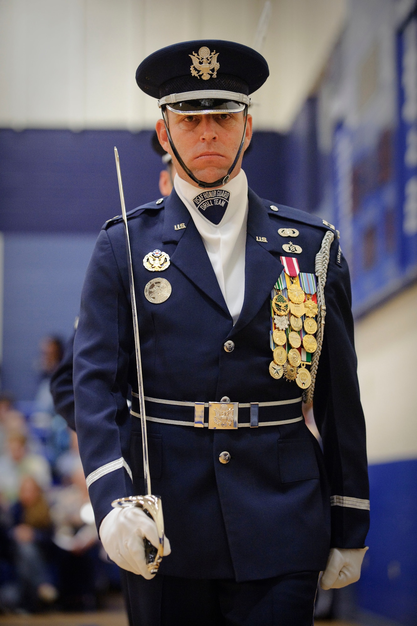 Capt. Michael Fanton, U.S. Air Force Honor Guard Drill Team commander marches into the Randolph High School gymnasium during an assembly on Nov. 2. (U.S. Air Force photo/Steve Thurow)