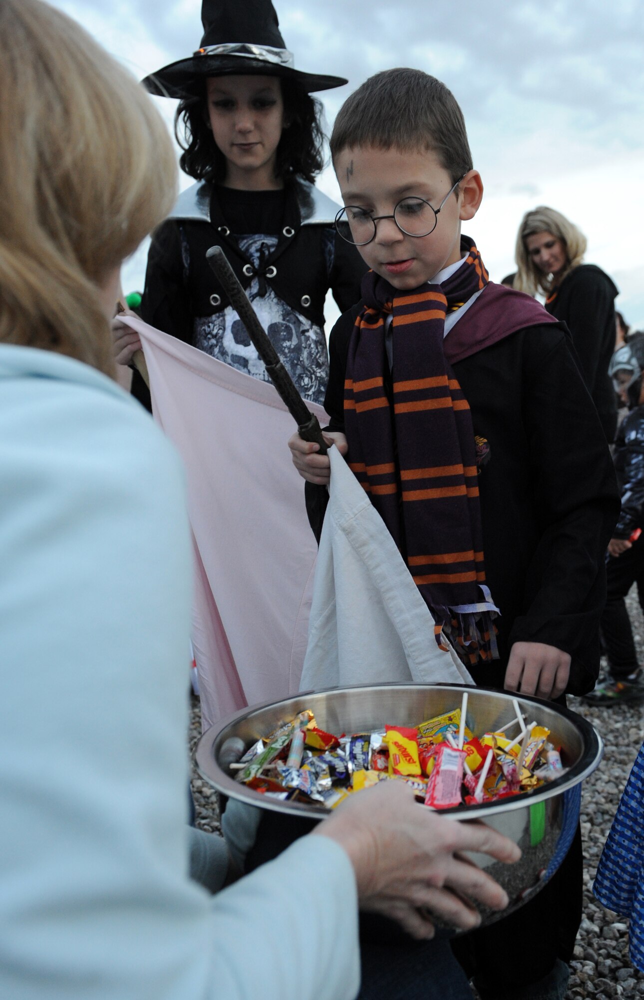 MOUNTAIN HOME AIR FORCE BASE, Idaho -- Nathan, 8, goes trick-or-treating dressed as Harry Potter in base housing Oct. 31. The 366th Security Forces Squadron conducts a pumpkin patrol on base each year to ensure the safety of children and their families as they trick-or-treat and celebrate Halloween. (U.S. Air Force photo by Airman 1st Class Debbie Lockhart)