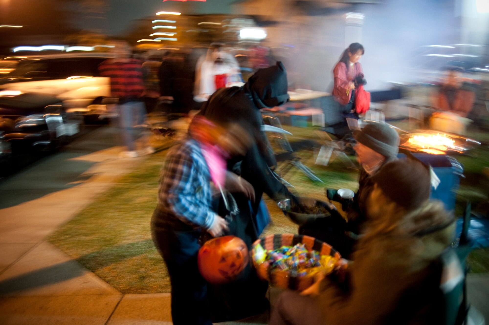 MISAWA AIR BASE, Japan -- Costumed children trick-or-treat throughout base housing on Halloween. Base residents decorated their homes and offered a variety of treats for the children. (U.S. Air Force photo/Staff Sgt. Samuel Morse)