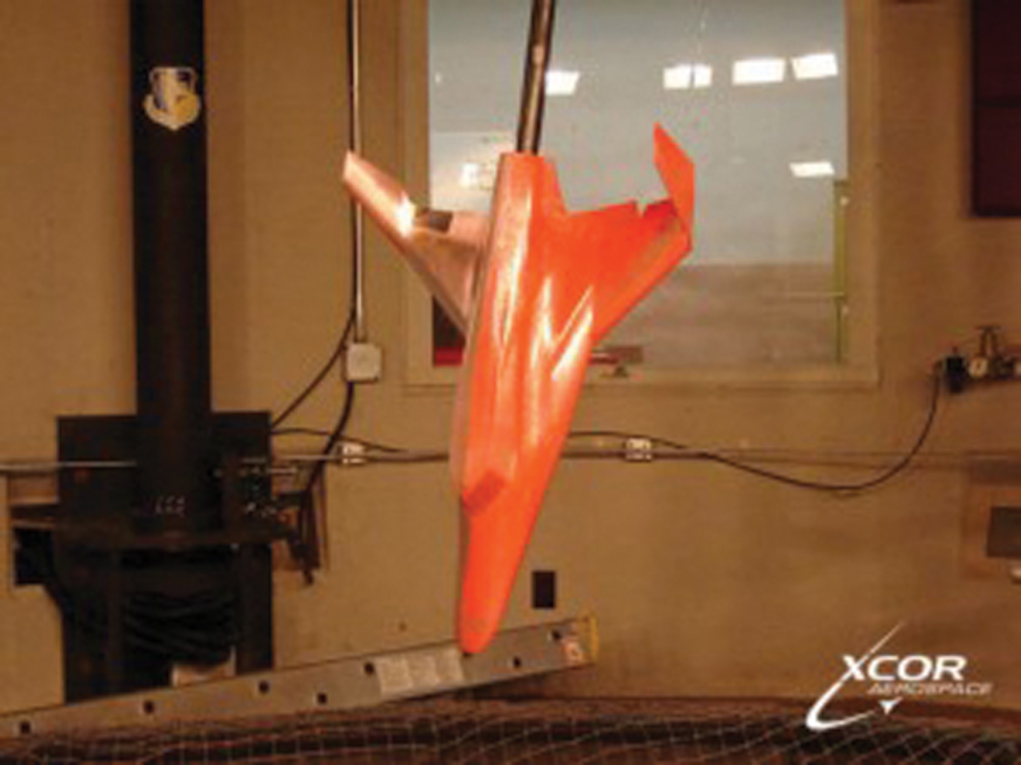XCOR Aerospace, Inc., uses red dye in testing the aerodynamic design of its all-metal 1/16th-scale Lynx suborbital launch vehicle model.  The company completed the test series using the Air Force Research Laboratory wind tunnel facility at Wright-Patterson Air Force Base, Ohio.