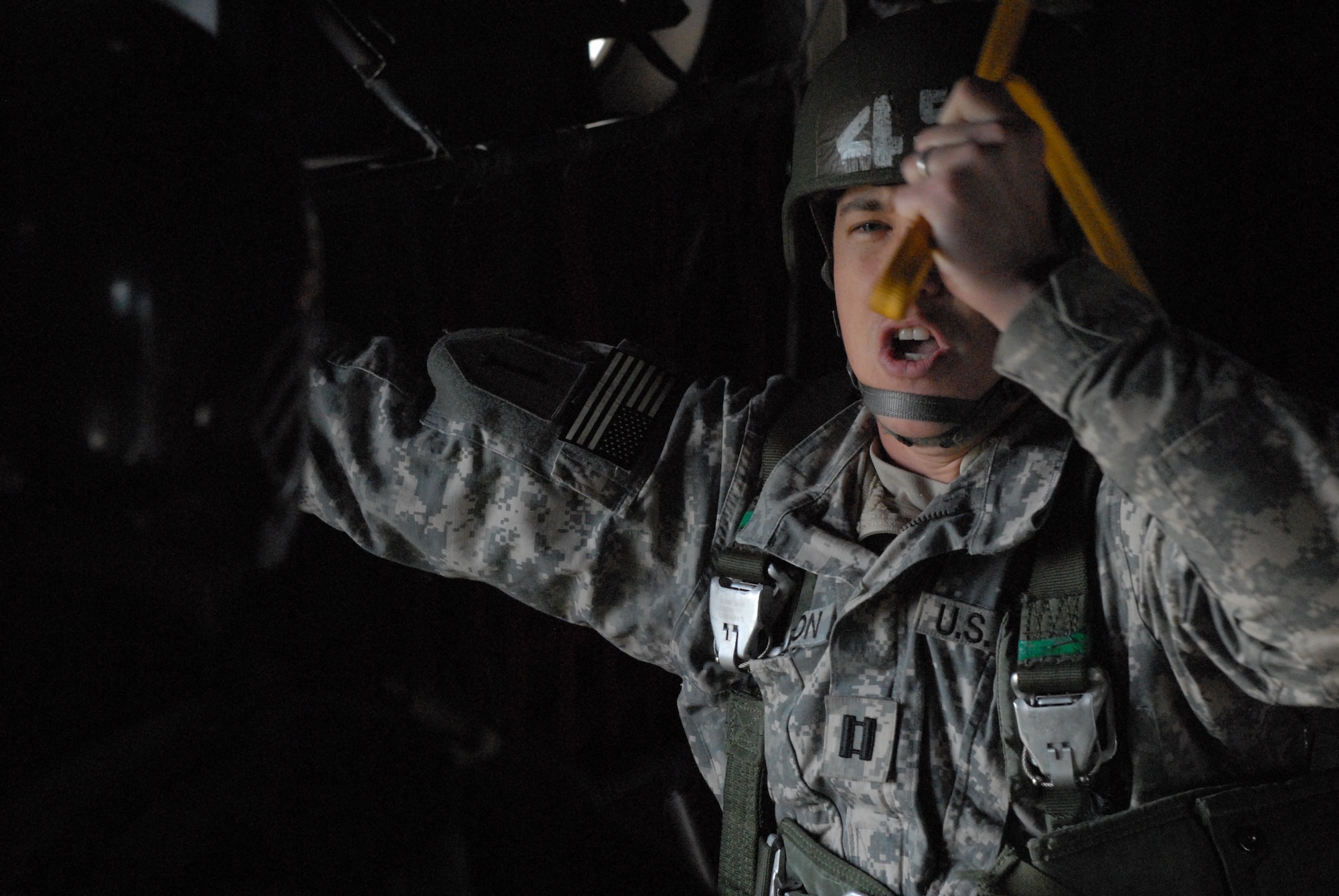 A paratrooper from the 82nd Airborne Division’s Advanced Airborne school prepares to jump out of a C-130H3 Oct. 27 as part of a joint force exercise at Pope AFB, N.C. The JFEX focused on cohesive training between the Air Force and Army to reestablish forcible entry capability through air power. (U.S. Air Force photo by Senior Airman Nathan Allen)