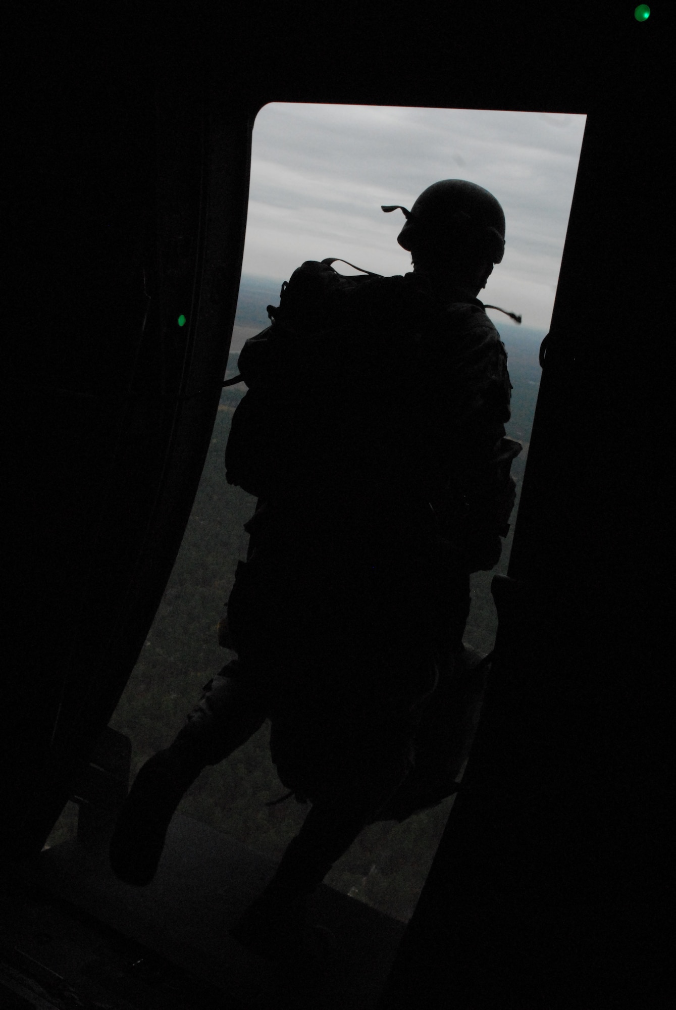 A paratrooper from the 82nd Airborne Division’s Advanced Airborne school at Fort Bragg, N.C., jumps out of a C-130H3 Oct. 27 as part of a joint force exercise at Pope AFB, N.C. The JFEX focused on cohesive training between the Air Force and Army to reestablish forcible entry capability through air power. (U.S. Air Force photo by Senior Airman Nathan Allen)