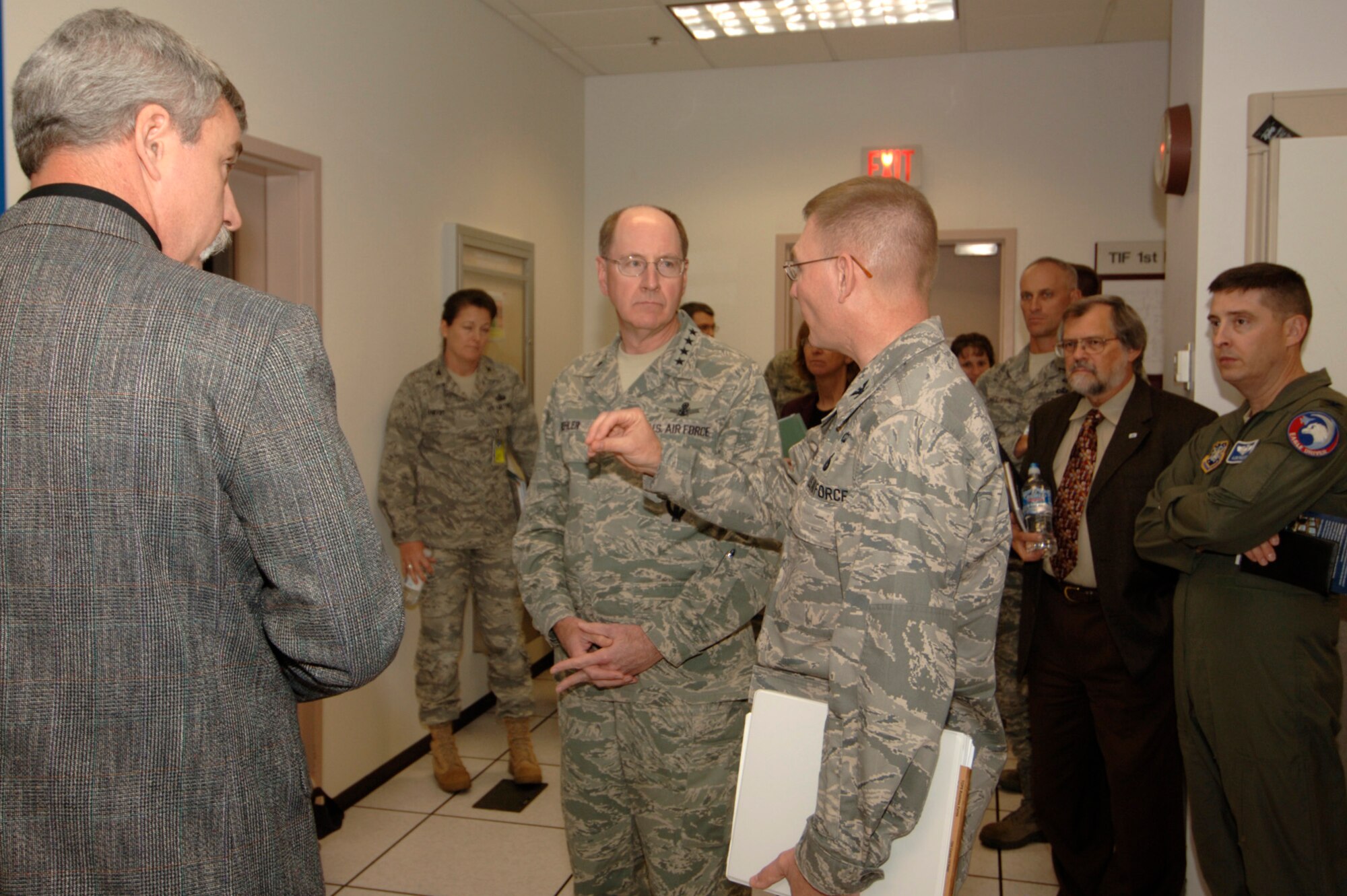 Col. John Odey, commander of the Air Force Network Integration Center
at Scott Air Force Base, Ill., explains the mission of the center's network
integration facility to Gen. C. Robert Kehler, commander for Air Force Space
Command. Colonel Odey's team also demonstrated simulated network warfare
exercises on the center's training range.  The visit was part of the
general's effort to move forward on realignments for organizations that fall
under the Air Force's cyberspace mission construct.
