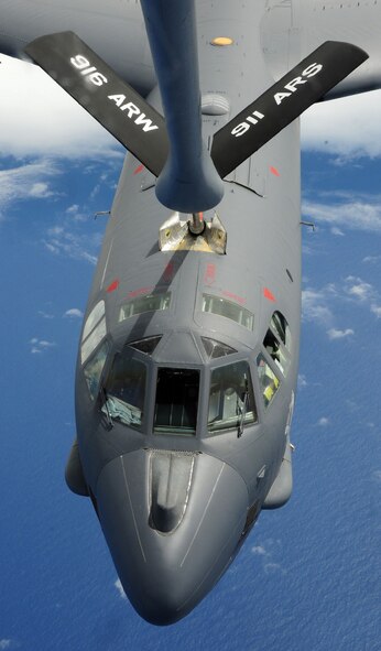 SEYMOUR JOHNSON AIR FORCE BASE, N.C. --  A KC-135R Stratotanker from here off-loads fuel to a B-52 over Guam.