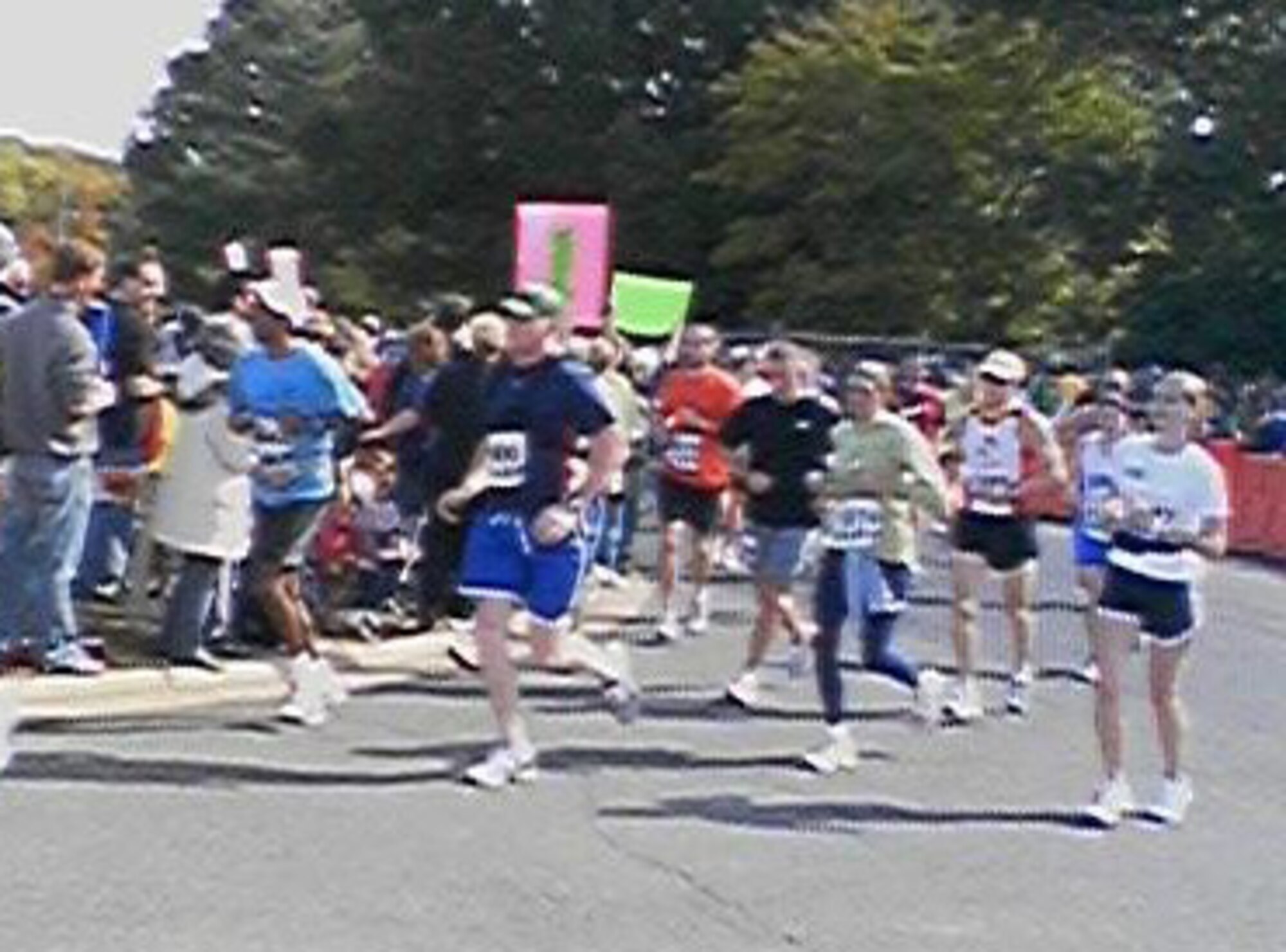SEYMOUR JOHNSON AIR FORCE BASE, N.C. -- Tech. Sgt. Billy McGuinness of the 916th Communication Squadron ran the Marine Corps Marathon on Oct. 25th in Washington D.C. He is seen here crossing the finish line with green John Deere hat.