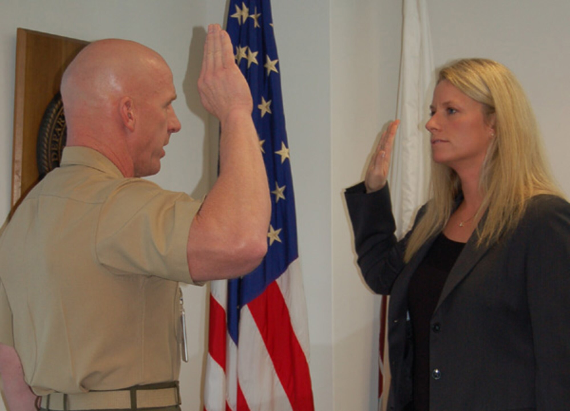 SEYMOUR JOHNSON AIR FORCE BASE, N.C. -- Gold Star Mother Michele Norris takes her enlistment oath at Quantico, Virginia. She is assigned to the 916th Maintenance Group.