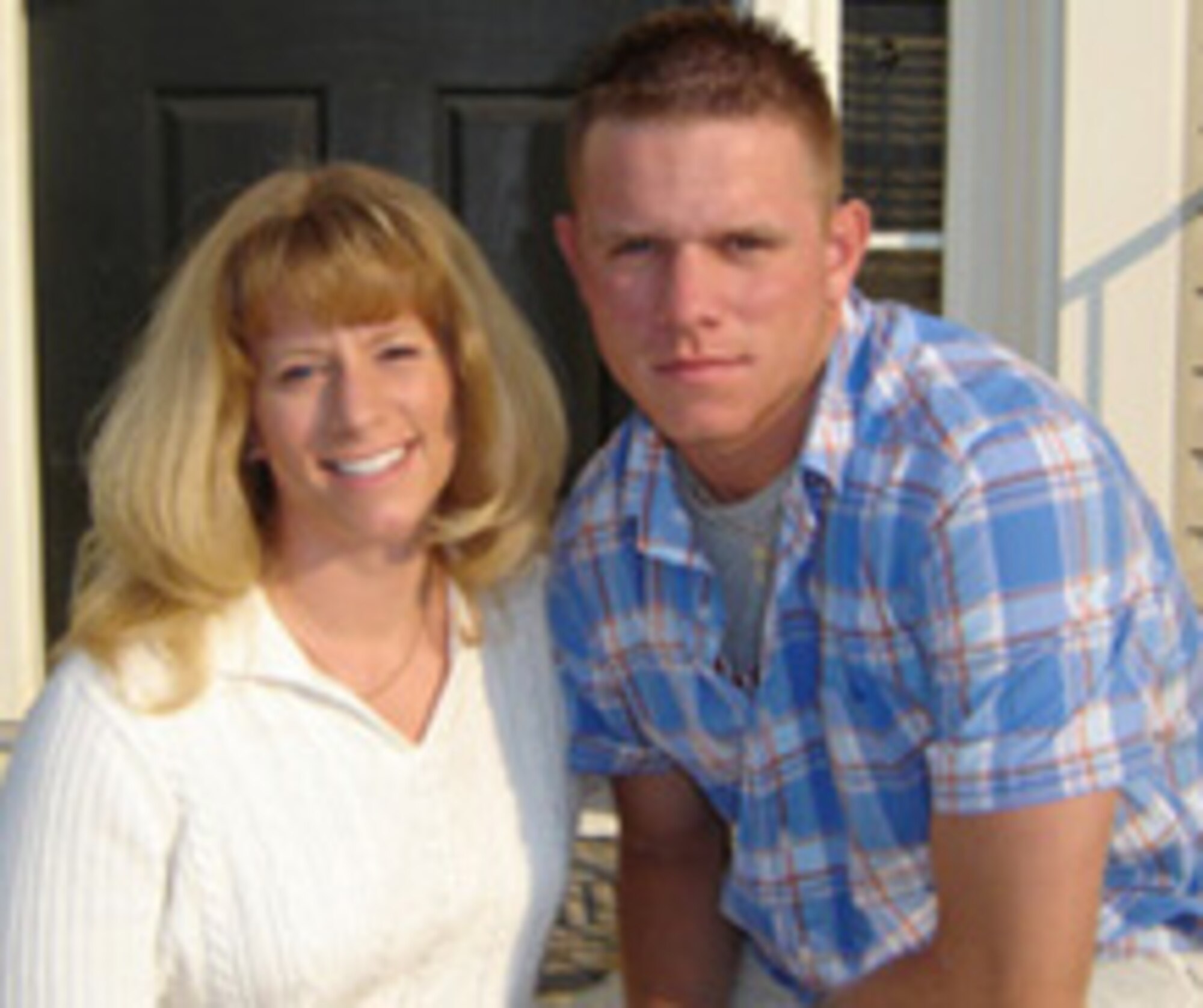 SEYMOUR JOHNSON AIR FORCE BASE, N.C. -- Michele Norris with her son Jeremy. Michele enlisted with the 916th Air Refueling Wing on Oct. 9, 2009.                         