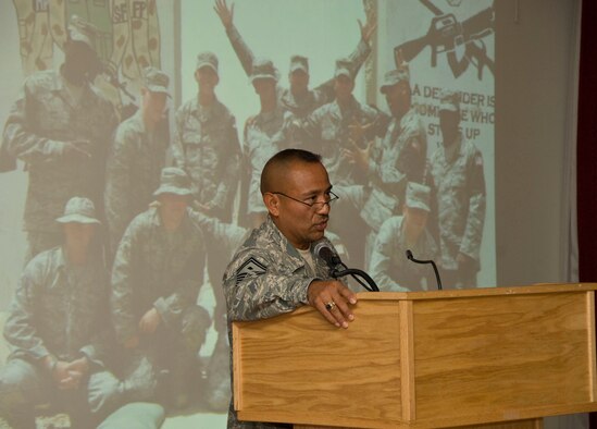 Senior Master Sgt. Raul Ruiz, Electronic Systems Center and 66th Air Base Wing first sergeant, tells the audience at the Oct. 29 Heritage of Freedom Forum about his deployment to Joint Base Balad in Iraq. Col. William Andrews, who was shot down and taken prisoner of war during Desert Storm, and Capt. Scott Carstetter, 653d Electronic Systems Group, also addressed the forum. (Air Force photo by Mark Herlihy)
