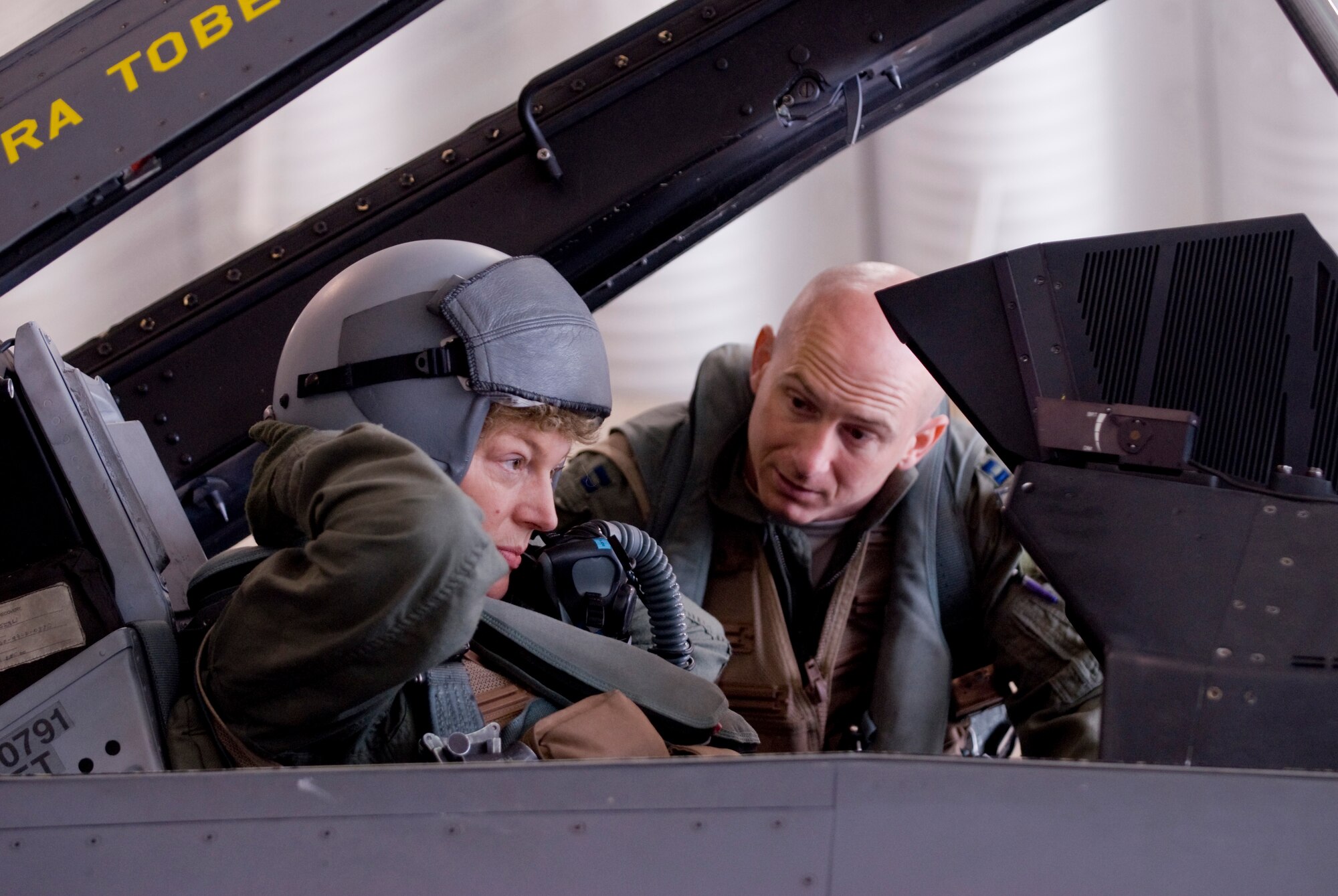 KUNSAN AIR BASE, Republic of Korea -- Capt. George Collings, 80th Fighter Squadron, helps Kathleen Stephens, U. S. Ambassador to the Republic of Korea, into an F-16 Fighting Falcon Oct. 29. Ambassador Stephens visited Kunsan for base familiarization and to speak with Airmen. (U.S. Air Force photo/Senior Airman Jonathan Steffen)