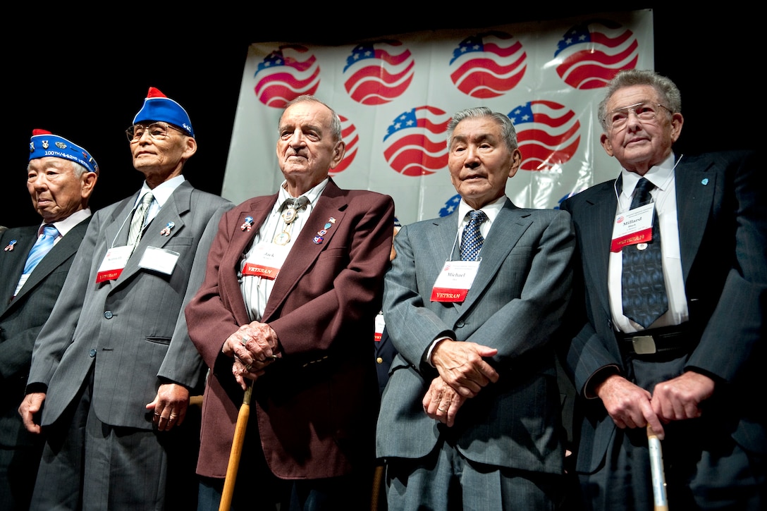 Veterans of the 141st Infantry Regiment and the 442nd Regimental Combat Team are recognized at the 65th anniversary of the rescue of the "Lost Battalion" in Houston, Texas, Nov. 1, 2009. The 442nd, a segregated unit comprised of mostly Japanese Americans, became the most decorated in U.S. military history, earning the nickname: the "Purple Heart Battalion."