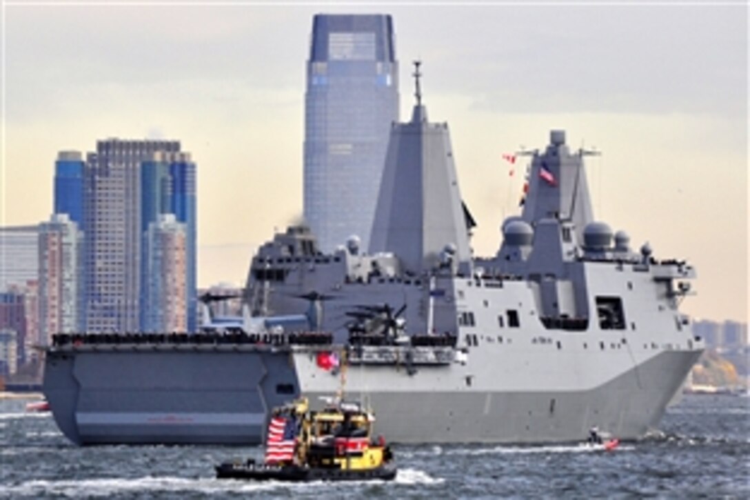 U.S. Army Corps of Engineers and the Park Police escort the Precommissioning Unit New York as the ship sails into New York Harbor Monday, Nov. 2, 2009. The amphibious transport dock, laid with seven and a half tons of steel from the World Trade Center in its bow, will be commissioned in a ceremony at the Intrepid Air, Sea and Space Museum Nov. 7. It is the sixth Navy ship to bear the name New York.