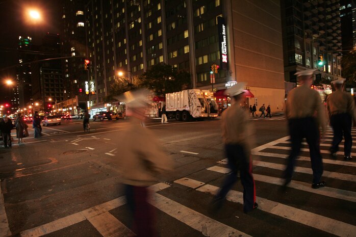 Marines from Special Purpose Marine Air Ground Task Force 26 walk out into New York on their first night of liberty, Nov. 2. The Marines came into town aboard the USS New York to participate in the commissioning ceremony and other community outreach events this week. The ship is constructed from seven and a half tons of steel salvaged from the World Trade Center towers. (Official Marine Corps photo by Sgt. Randall A. Clinton)
