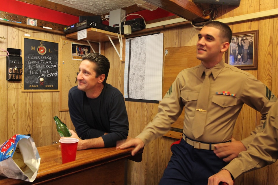 Corporal  John W. Weidenhammer of  Special Purpose Marine Air Ground Task Force 26 enjoys an afternoon with Marines at the Staten Island Marine Corps League Nov. 3, 2009. The SPMAGTF-26 Marines and sailors visited the club to trade sea stories with the Marines. The unit was formed by North Carolina Marines from several units to support the commissioning of USS New York Nov. 7.