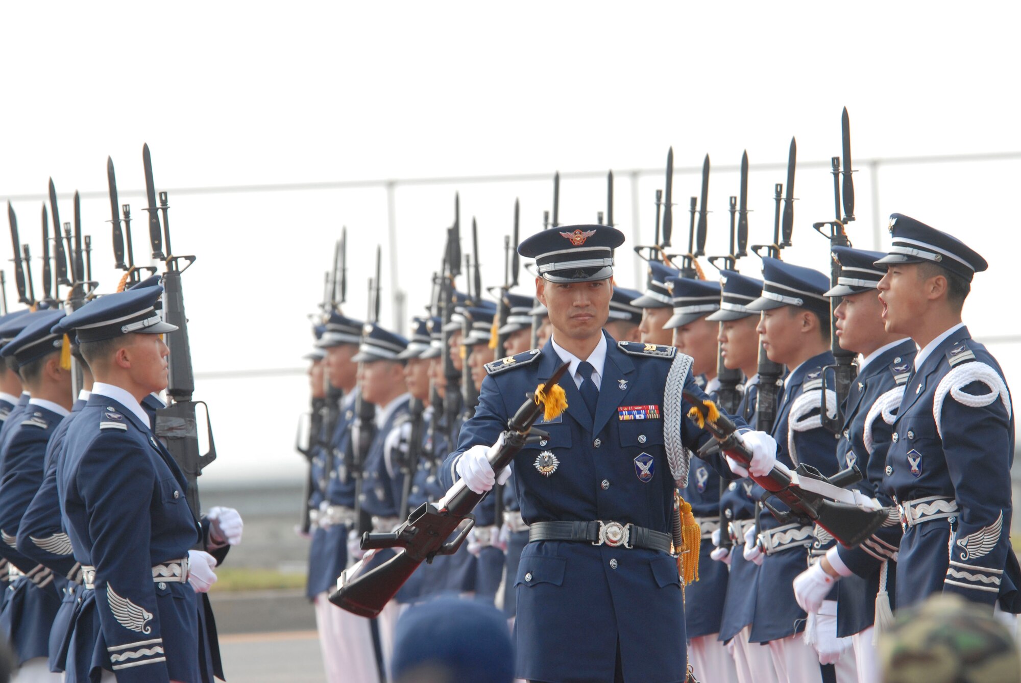 KUNSAN AIR BASE, Republic of Korea -- The Republic of Korea honor guard performs for the crowd during the opening ceremony of the Air Show at Gunsan City. The City of Gunsan, 8th Fighter Wing and Republic of Korea Air Forces' 38th Fighter Group hosted the Air Show in Gunsan City, Oct. 31. (U.S. Air Force photo/Staff Sgt. Darnell T. Cannady)