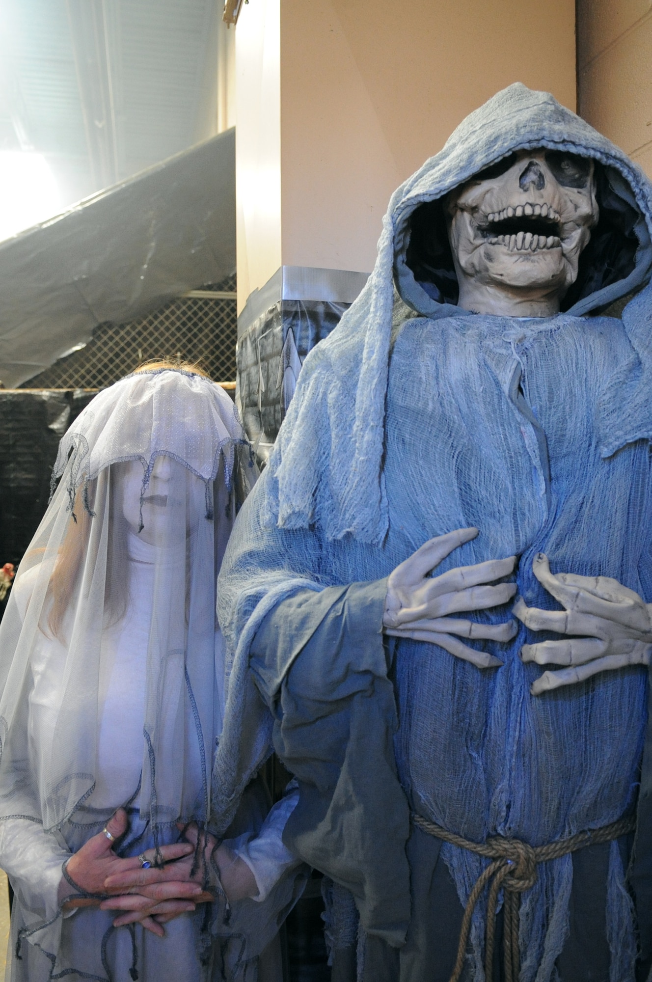 BUCKLEY AIR FORCE BASE, Colo.-- A laughing corpse and a living dead girl near the end of the 460th Civil Engineer Squadron Halloween "Slaughter House" Oct. 31. (U.S. Air Force photo by Airman 1st Class Paul Labbe)