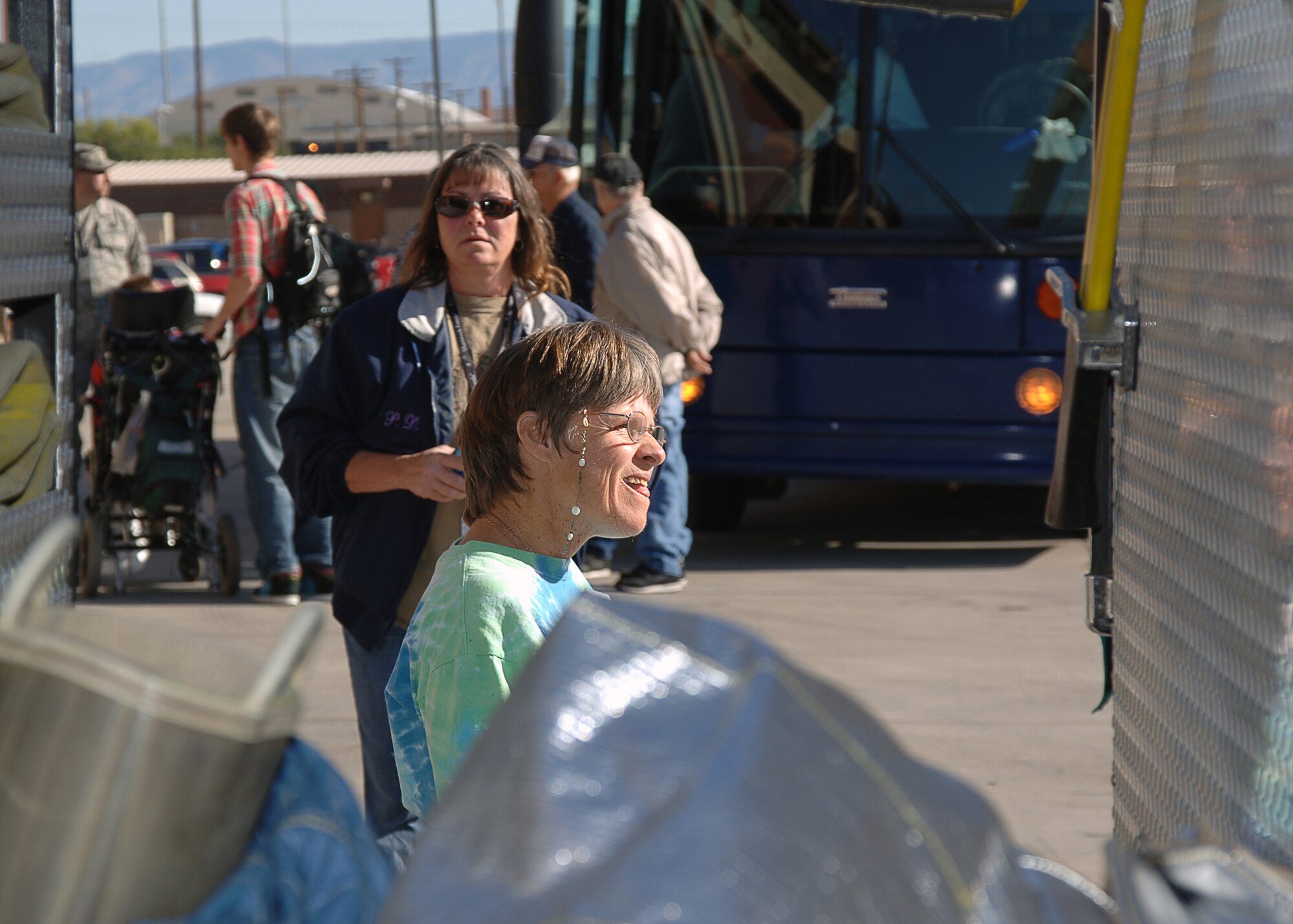 HOLLOMAN AIR FORCE BASE, N.M. -- Debbie, a tour patron, tours one of Holloman Fire Department?s fire engines here Oct. 23. Special needs people from Zia Therapy Center and Otero County Special Olympics toured the fire department, an F-22A Raptor and were also treated to an exclusive air show open only to base personnel. (U.S. Air Force photo by Staff Sgt. Sanjay Allen) 