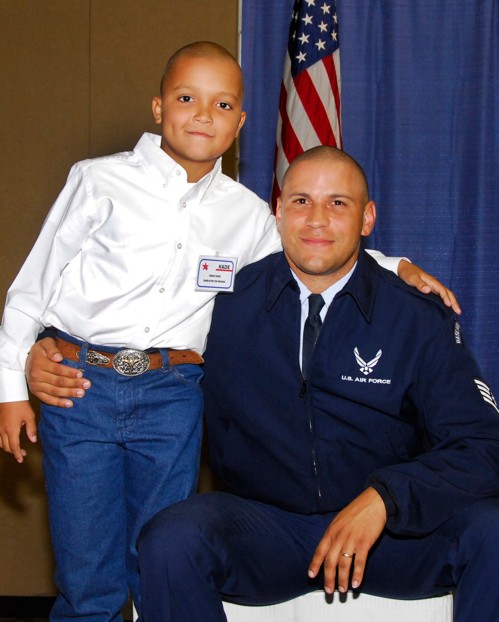 Staff Sgt. Philip Baham III, 366th Training Squadron and his son, Kade, pause for a photo after the Bahams were named Sheppard's Family of the Year for 2009. Not pictured are Tech. Sgt. Harmony Baham, 82nd Medical Group, and their 3-year-old son, Beaux. (U.S. Air Force photo/Harry Tonemah)