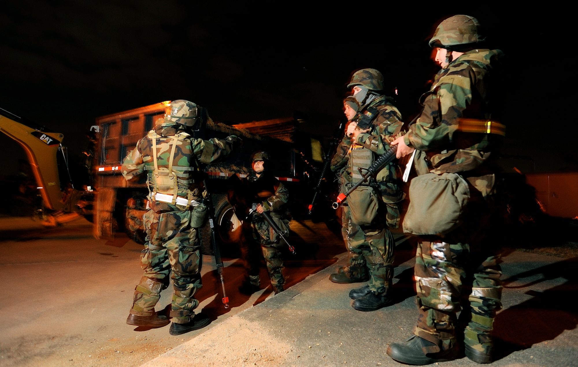 Airmen from the 51st Civil Engineer Squadron discuss the course of action after a simulated water main rupture near the flightline during operational readiness exercise Beverly Midnight 09-02, Nov. 3, at Osan Air Base, Republic of Korea. (U.S. Air Force photo/Staff Sgt. Brian Ferguson



