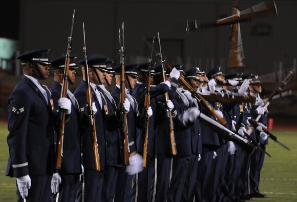 The United States Air Force Honor Guard Drill Team performs at halftime at an Angelo State University football game Oct. 31 in San Angelo, Texas.  The Drill Team tours worldwide representing all Airmen while showcasing Air Force precision and professionalism and personifying the integrity, discipline, and teamwork of every Airman and every Air Force mission. During the Air Force Honor Guard's 60-year history, their traveling component, the Drill Team, has performed in every state of the union and many countries abroad. (U.S. Air Force photo by Senior Airman Sean Adams) 