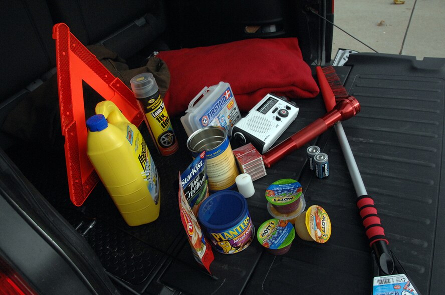 OFFUTT AIR FORCE BASE, Neb. - An emergency safety kit complete with a flash light, batteries, food, a first aid kit, blanket and other necessary items is displayed in the back of a Honda Element in the parking lot outside Bldg. 88 here Nov. 2. With the winter months rapidly approaching, members of Team Offutt are highly encouraged to ensure their vehicles, homes and themselves are prepared. U.S. Air Force Photo by Kendra Williams