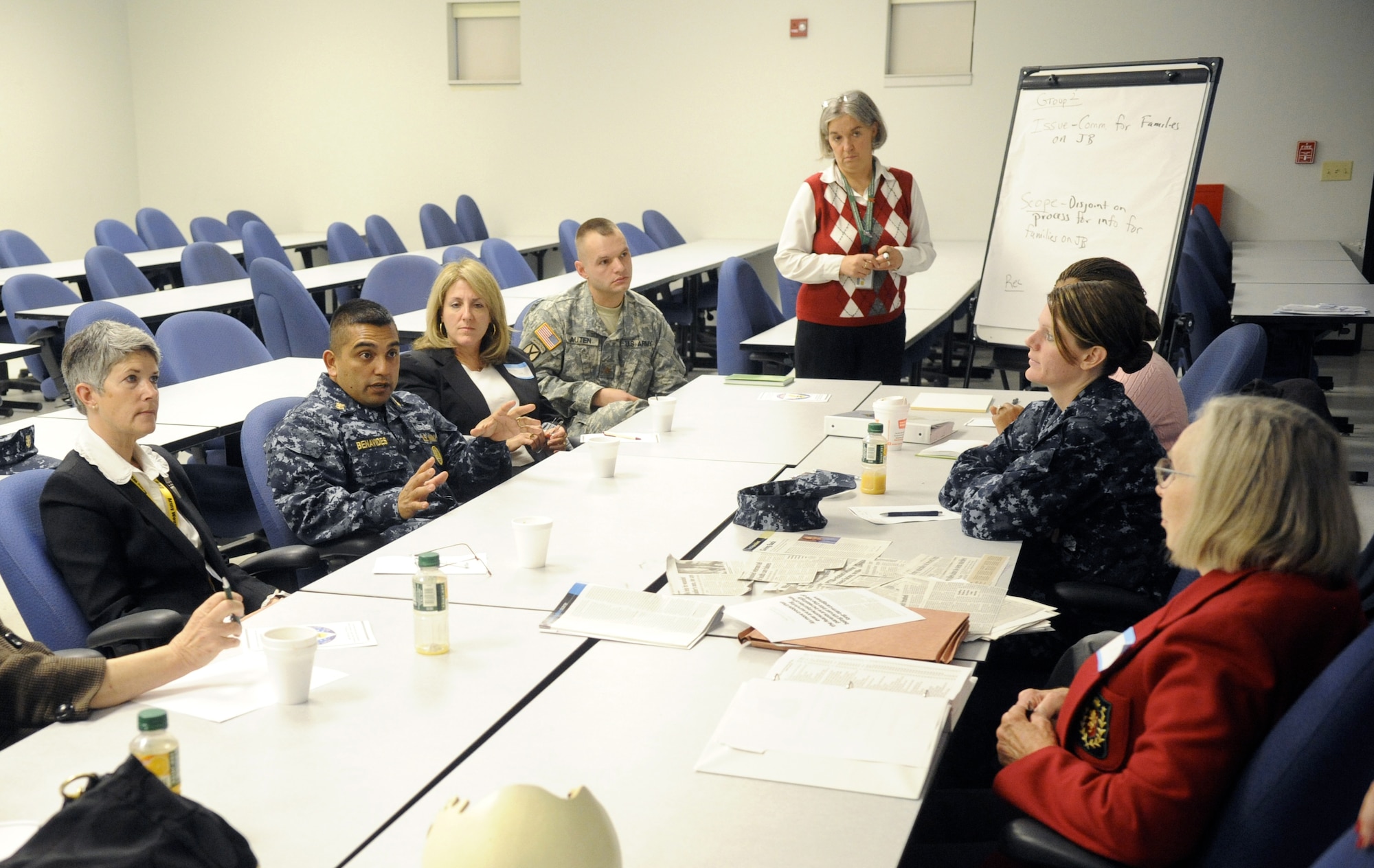 Attendees break into small groups to discuss a variety of issues that affect military families at the Military Family Action Plan conference here Oct. 29. MFAP provides a means of policy change by helping leadership address the needs and concerns of military members and their families.  (U.S. Air Force Photo/Carlos Cintron)
