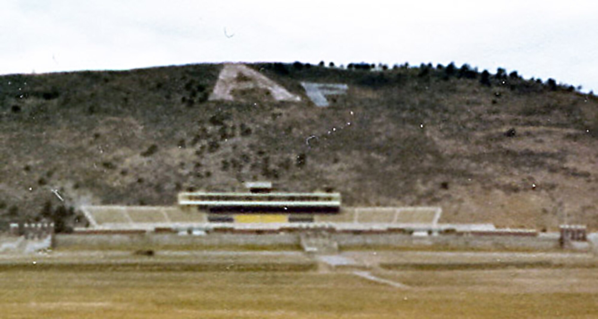A group of six to eight Air Force Academy graduates from the Class of 1977 added an "F" to the "A" on the hill above CSU's football stadium in 1979. (U.S. Air Force photo courtesy of Steven Simon)