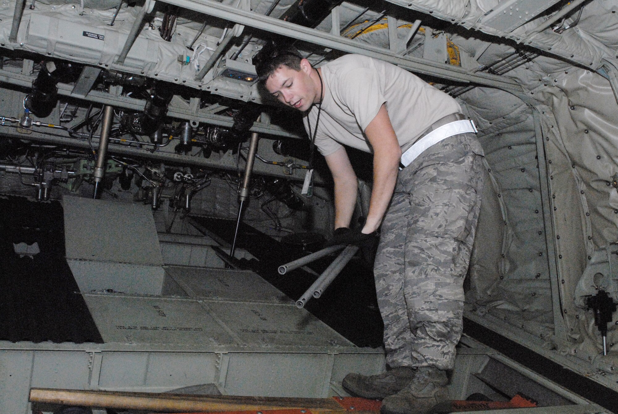 Senior Airman William Heptig stows jump cables during the preflight maintenance of a C-130 Hercules as part of Joint Forcible Entry Exercise 10-01 Oct. 28, 2009, at Pope Air Force Base, N.C. The JFEX focused on cohesive training between the Air Force and Army to re-establish forcible entry capability through airpower. Airman Heptig is a 19th Aircraft Maintenance Squadron crew chief from Little Rock AFB, Ark. (U.S. Air Force photo/Senior Airman Nathan Allen) 