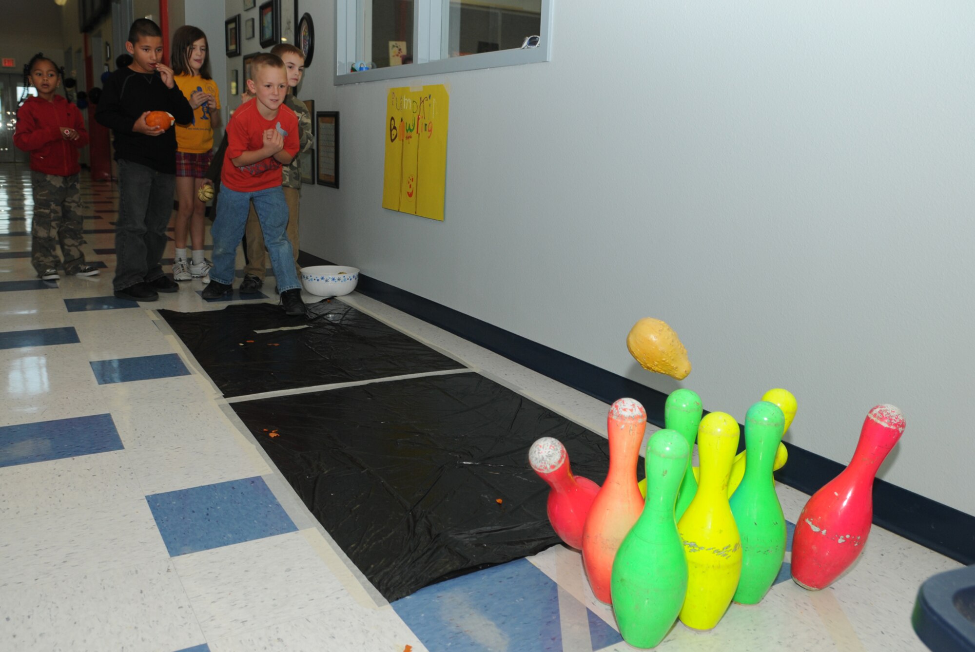 GOODFELLOW AIR FORCE BASE, Texas -- D'Artagan Moorehead tries for a strike during the Children's Fall Festival Pumpkin Bowling, Oct. 29, 2009. (U.S. Air Force photo/Airman Clayton Lenhardt)
