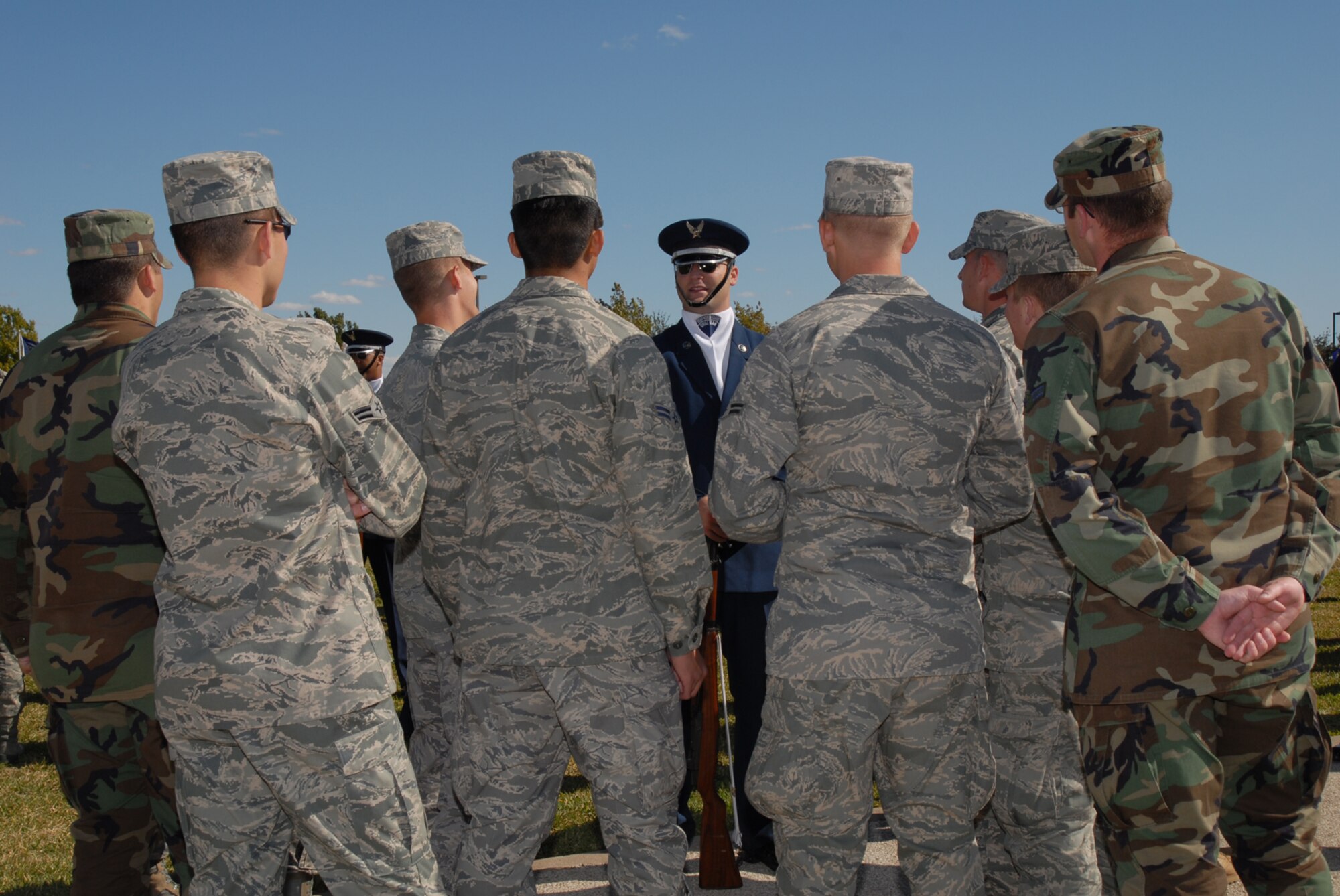 GOODFELLOW AIR FORCE BASE, Texas -- Senior Airman Mark Freda, U.S. Air Force Honor Guard Drill Team, speaks with Airmen from Goodfellow following a performance by the drill team, Oct. 30, 2009. The Drill Team is the traveling component of the U.S. Air Force Honor Guard and tours worldwide representing all Airmen while showcasing Air Force precision and professionalism. (U.S. Air Force photo/Staff Sgt. Laura R. McFarlane) 
