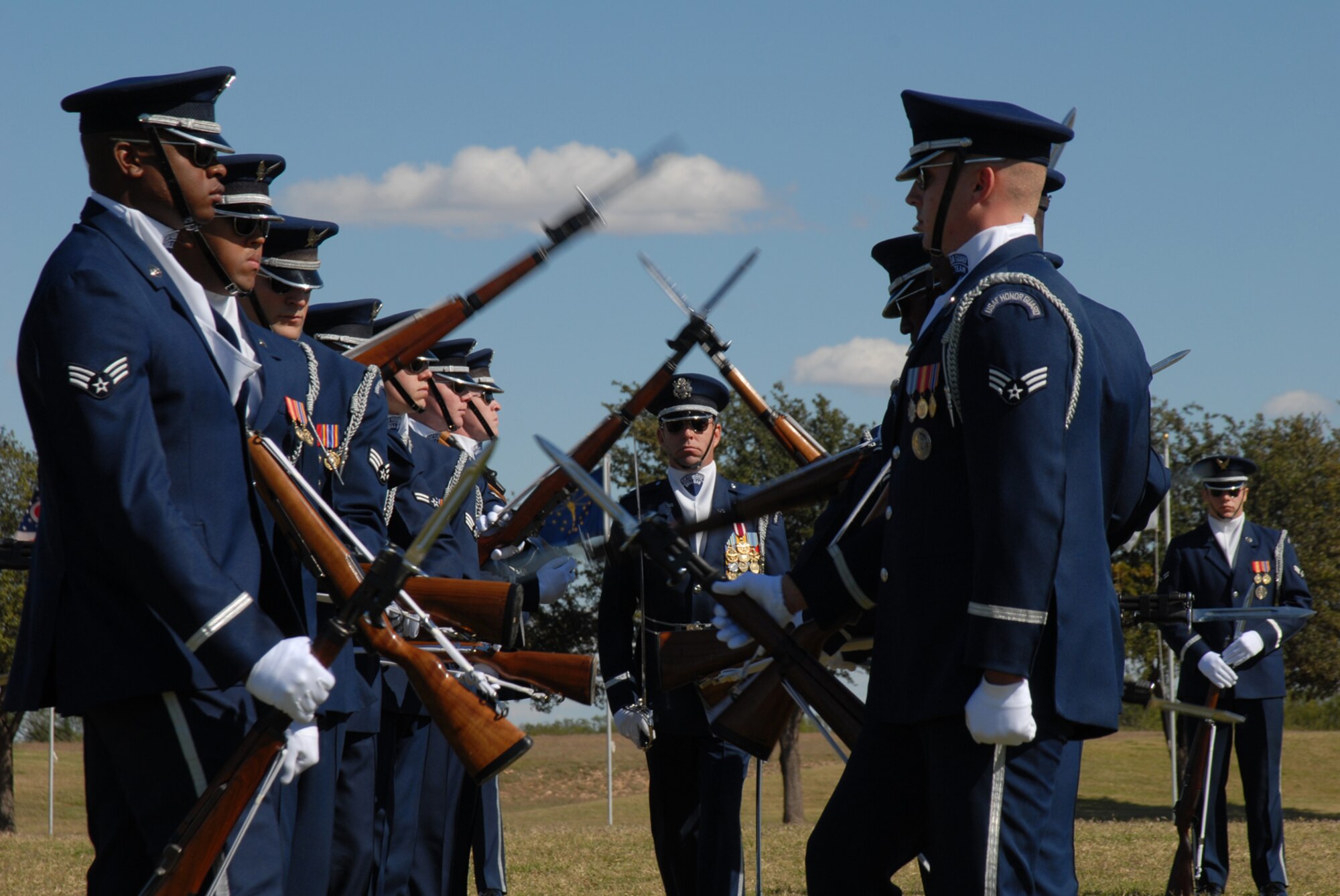 GOODFELLOW AIR FORCE BASE, Texas -- Capt. Michael Fanton walks the "gauntlet" during the U.S. Air Force Honor Guard Drill Team performance at the parade grounds, Oct. 30, 2009. The Drill Team is the traveling component of the U.S. Air Force Honor Guard and tours worldwide representing all Airmen while showcasing Air Force precision and professionalism. (U.S. Air Force photo/Staff Sgt. Laura R. McFarlane) 

