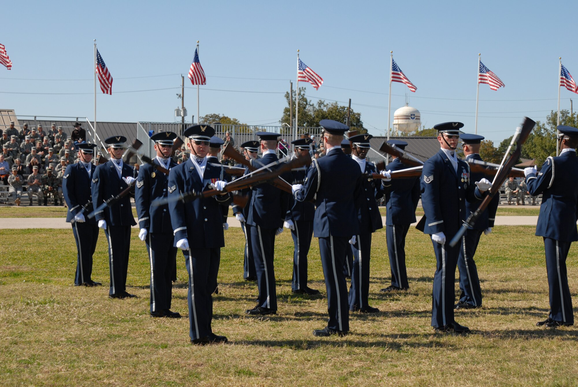 GOODFELLOW AIR FORCE BASE, Texas -- The U.S. Air Force Honor Guard Drill Team performs for base personnel at the parade grounds, Oct. 30, 2009. The Drill Team is the traveling component of the U.S. Air Force Honor Guard and tours worldwide representing all Airmen while showcasing Air Force precision and professionalism. (U.S. Air Force photo/Staff Sgt. Laura R. McFarlane)