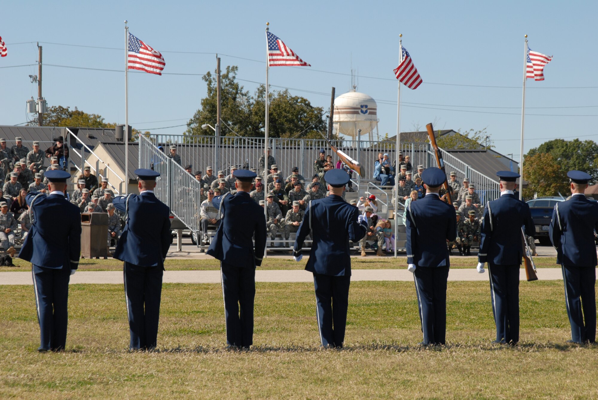 GOODFELLOW AIR FORCE BASE, Texas -- The U.S. Air Force Honor Guard Drill Team performs for base personnel at the parade grounds, Oct. 30, 2009. The Drill Team is the traveling component of the U.S. Air Force Honor Guard and tours worldwide representing all Airmen while showcasing Air Force precision and professionalism. (U.S. Air Force photo/Staff Sgt. Laura R. McFarlane)