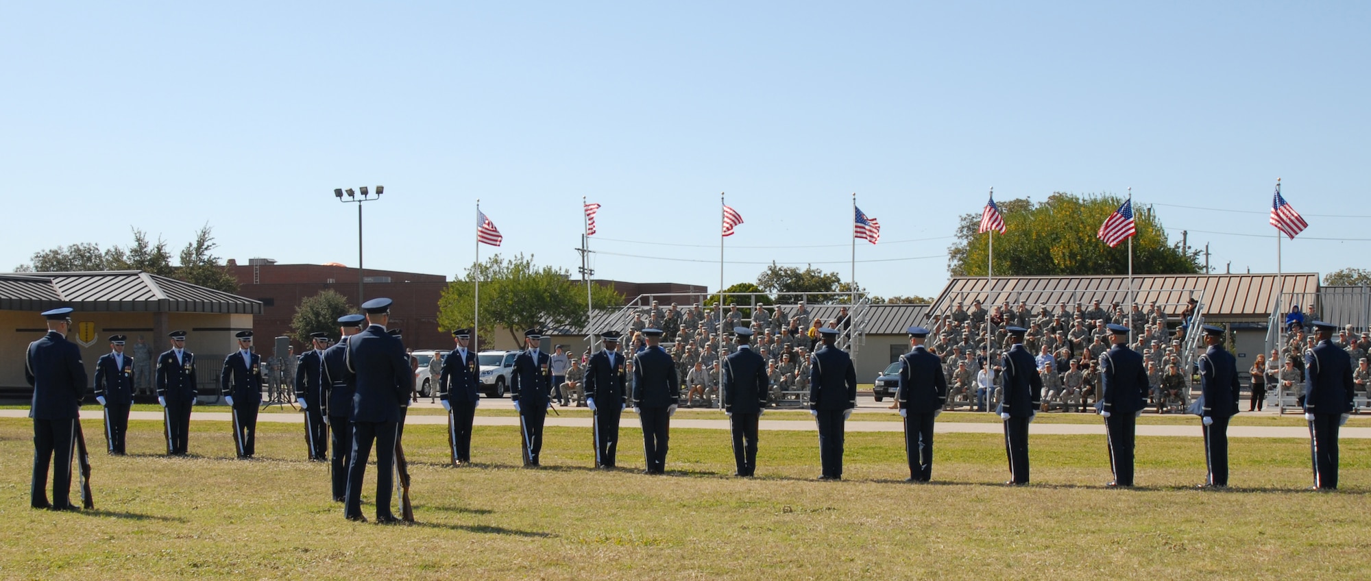 GOODFELLOW AIR FORCE BASE, Texas -- The U.S. Air Force Honor Guard Drill Team performs for base personnel at the parade grounds, Oct. 30, 2009. The Drill Team is the traveling component of the U.S. Air Force Honor Guard and tours worldwide representing all Airmen while showcasing Air Force precision and professionalism. (U.S. Air Force photo/Staff Sgt. Laura R. McFarlane)