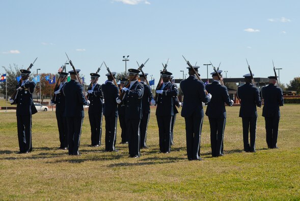GOODFELLOW AIR FORCE BASE, Texas -- The U.S. Air Force Honor Guard Drill Team performs for base personnel at the parade grounds, Oct. 30, 2009. The Drill Team is the traveling component of the U.S. Air Force Honor Guard and tours worldwide representing all Airmen while showcasing Air Force precision and professionalism. (U.S. Air Force photo/Staff Sgt. Laura R. McFarlane)