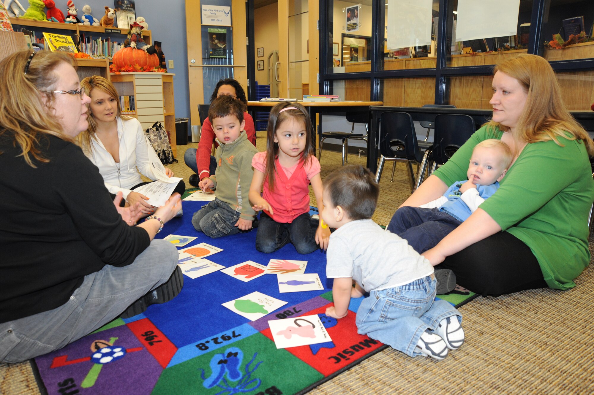 Parents as Teachers Heroes at Home program representatives hosted their first “Books and Babies” event at the library at McConnell Air Force Base, Kan., Nov. 2, 2009. The PATHAT program provides education and support to military children ages newborn to 3 years old. (U.S. Air Force photo by Tech. Sgt. Chyrece Campbell)