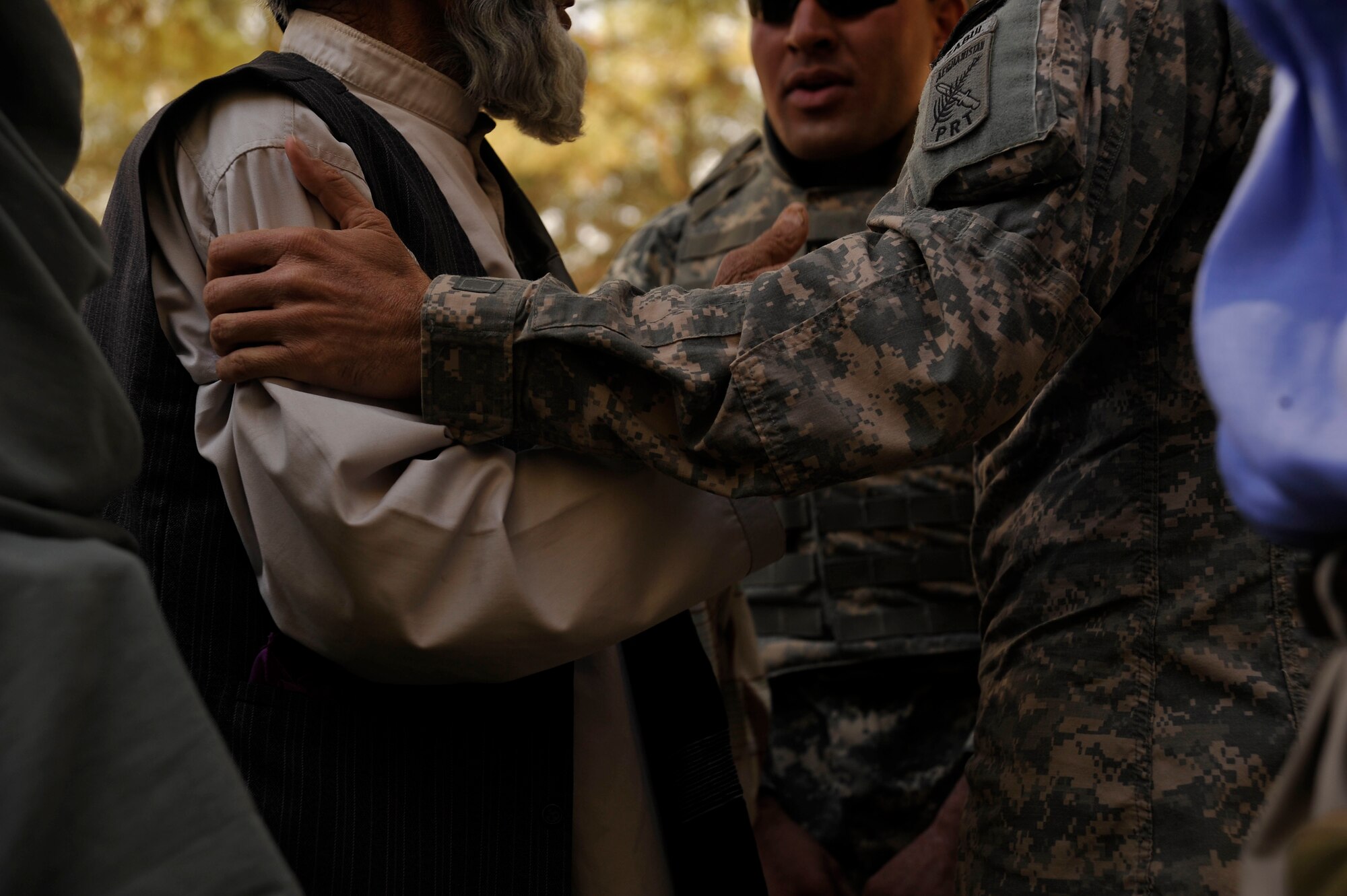 U.S. Air Force Lt. Col. Andy Veres, Commander of Provincial Reconstruction Team Zabul, speaks to citizens of Zabul Province about the importance of voting at a public meeting Oct. 23, 2009. (U.S. Air Force photo/Staff Sgt. Angelita Lawrence)
