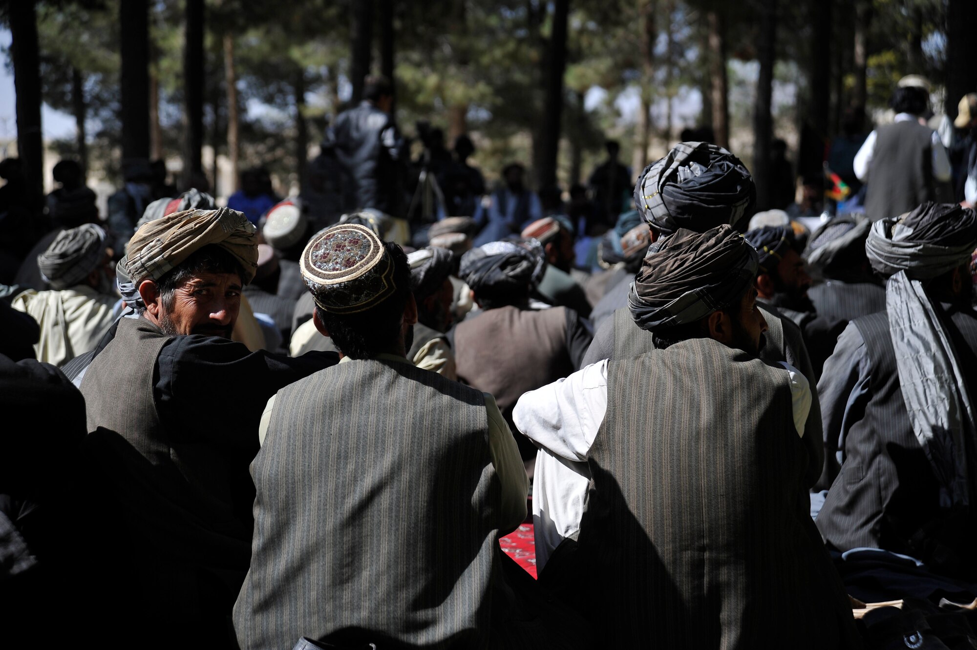 U.S.military members from Provincial Reconstruction Team (PRT) Zabul, provide security for the governor as he speaks with residents of Shar-e-Safa about their voting rights here Oct. 23, 2009. The governor is encouraging people in Zabul Province to vote so they can improve their county. (U.S. Air Force photo/Staff Sgt. Angelita Lawrence)