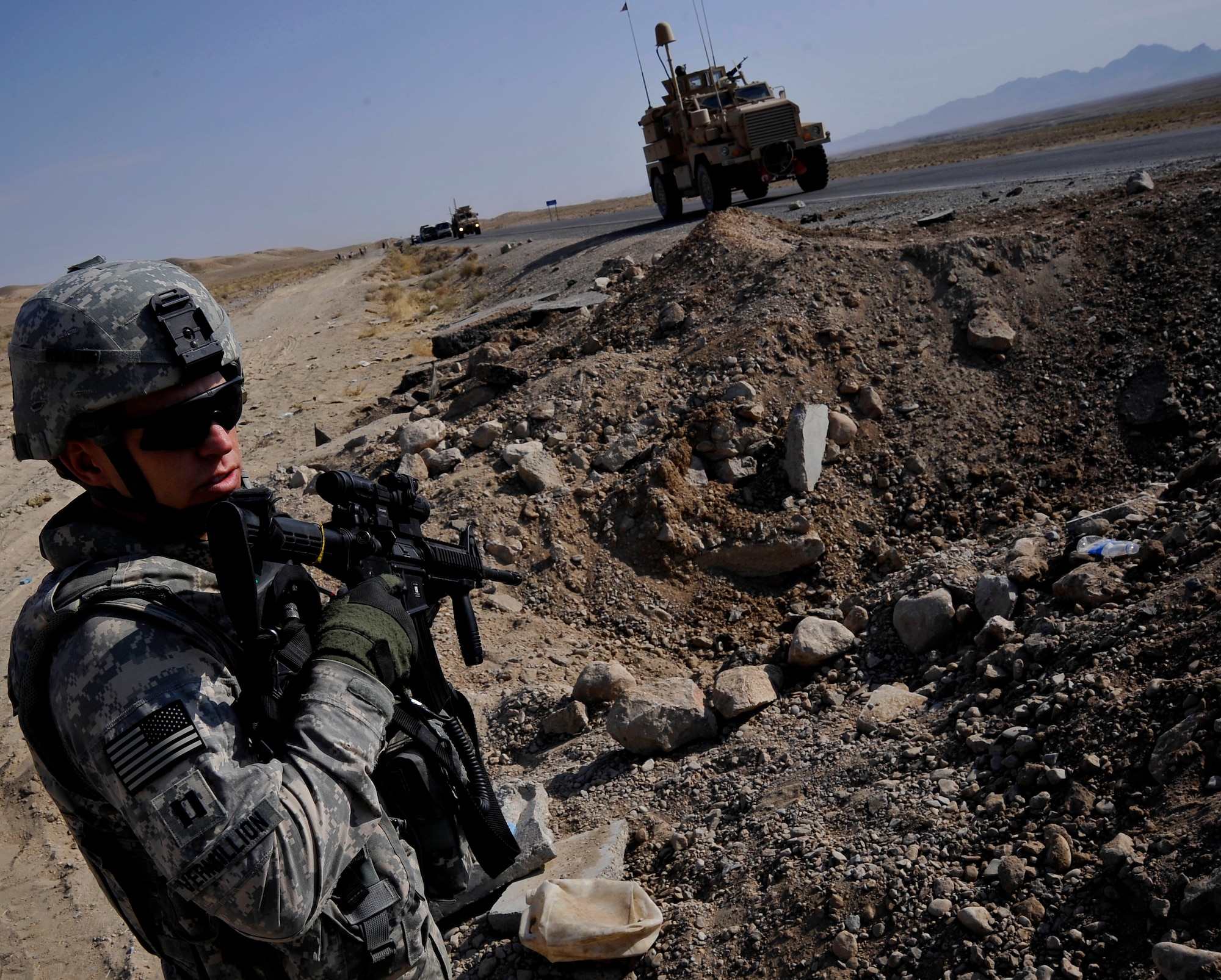 U.S. Air Force Capt. Rick Vermillion, an engineer assigned to Provincial Reconstruction Team Zabul, inspects a bridges for improvised explosives devices, damages, or traces of tampering, Oct. 23, 2009.  The inspections provide safety to the people of Zabul as well as coalition forces while traveling. (U.S. Air Force photo/Staff Sgt. Angelita Lawrence)
