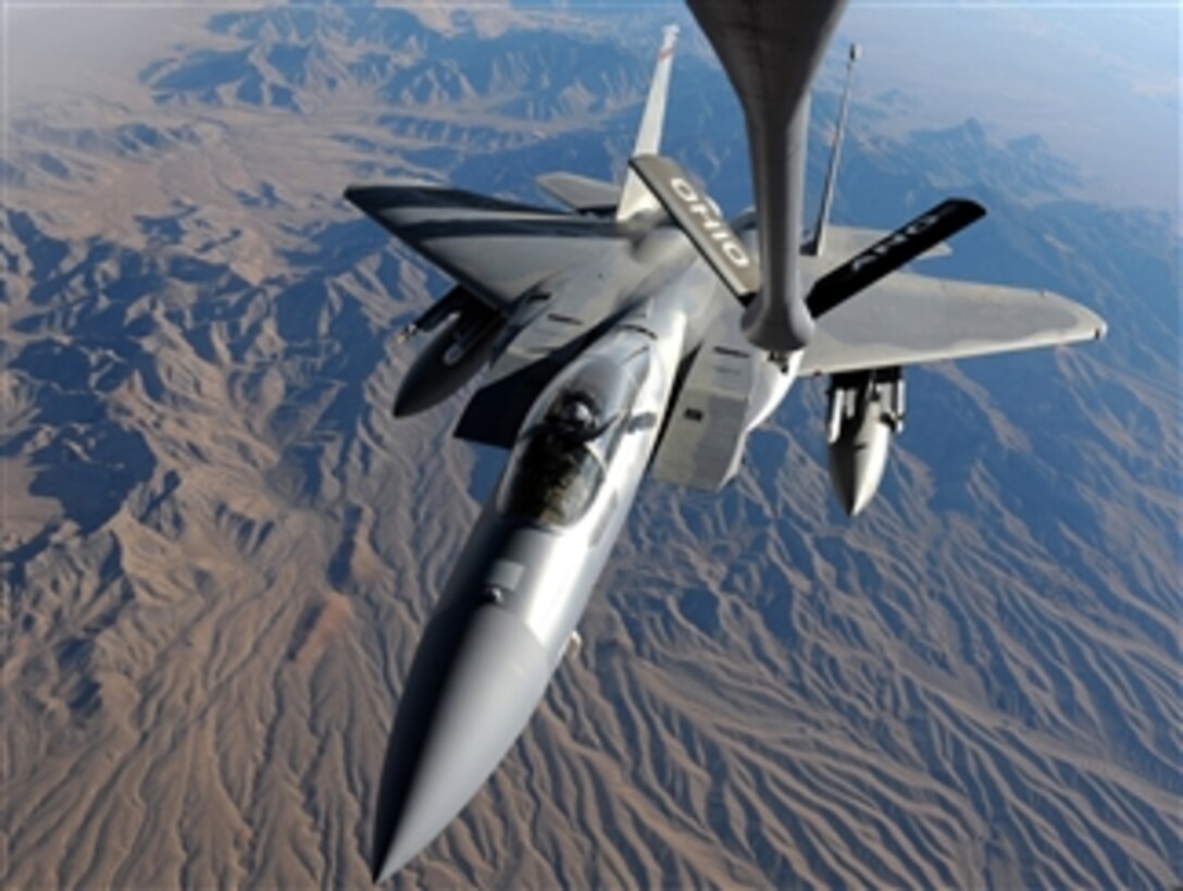 A U.S. Air Force F-15 Eagle aircraft from the 142nd Fighter Wing, Portland Air National Guard, Ore., flies toward the boom of an Ohio Air National Guard KC-135 Stratotanker aircraft over the Nevada Test and Training Range, north of Las Vegas, during Red Flag 10-1 on Oct. 29, 2009.  Red Flag is a realistic combat training exercise involving the air forces of the United States and its allies.  The exercise is conducted on the 15,000-square-mile Nevada Test and Training Range.  