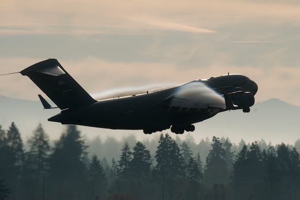 A C-17 Globemaster III departs the flightline for a mission. (U.S. Air Force photo/Abner Guzman)