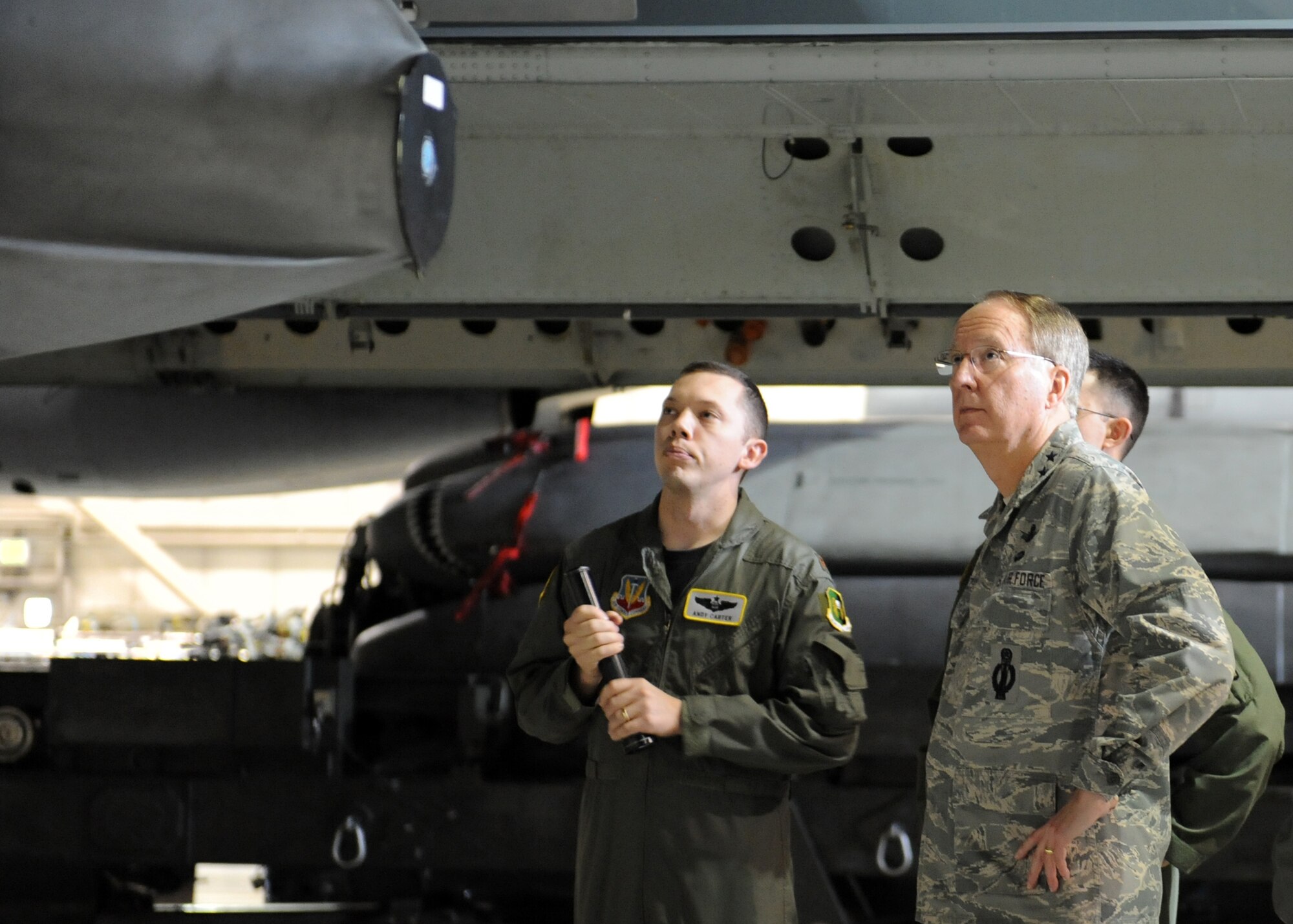 MINOT AIR FORCE BASE, N.D. -- Lt. Gen. Frank G. Klotz, Global Strike Command commander, discusses the capabilities of a B-52H Stratofortress with Maj. Andy Carter, 23rd Bomb Squadron radar navigator, here, Oct. 28. The general is here to meet members of Minot AFB and the local community. He is scheduled to be the featured speaker at the Minot Chamber of Commerce annual meeting and luncheon in Minot Oct. 29. (U.S. Air Force photo by Staff Sgt. Keith Ballard)
